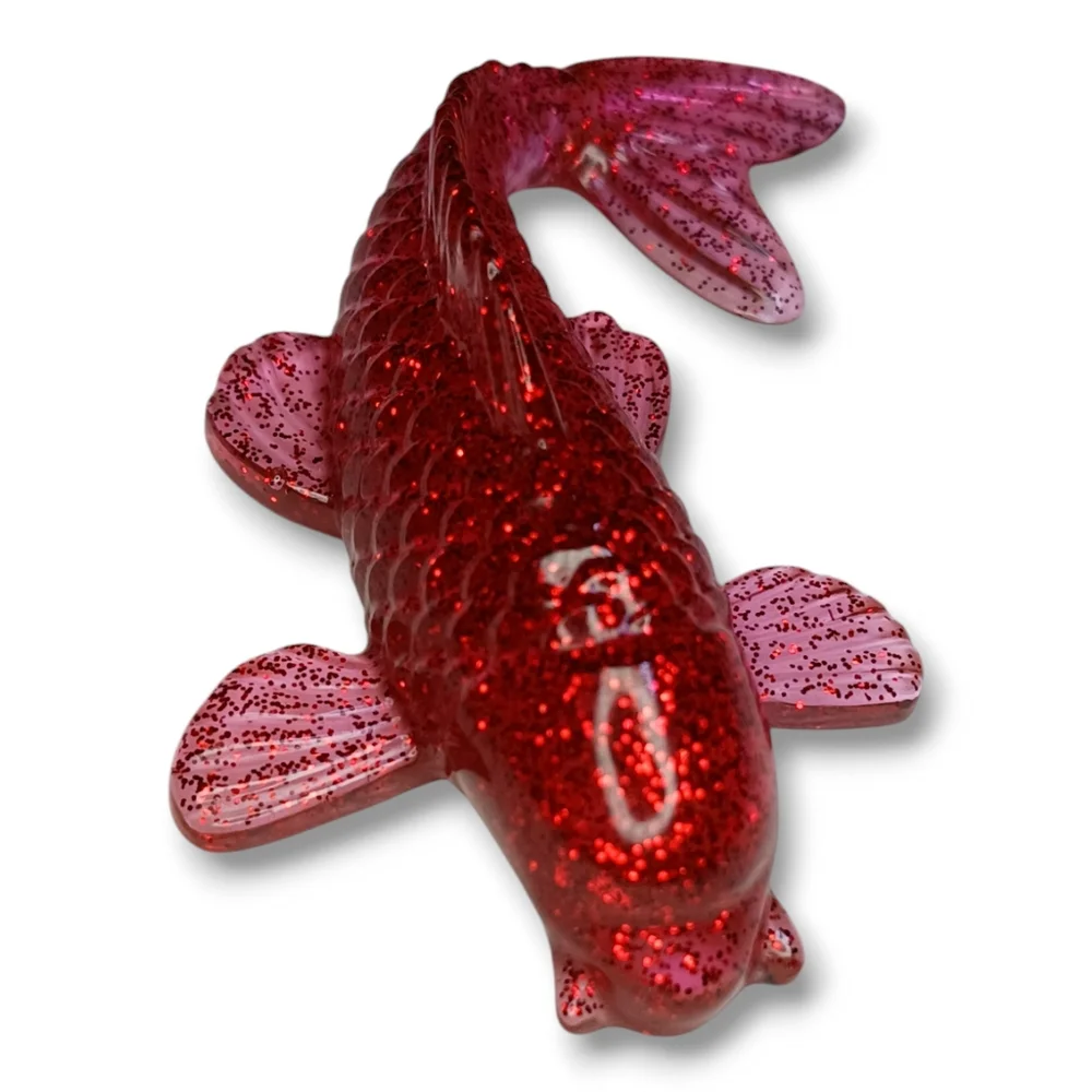 Vibrant Red Decorative Koi Fish Figurine with Textured Scales and Prominent Fins